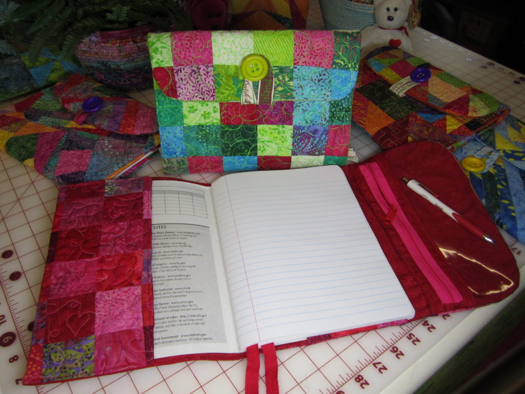 Tutorial shows how to cover a composition notebook with quilted fabric